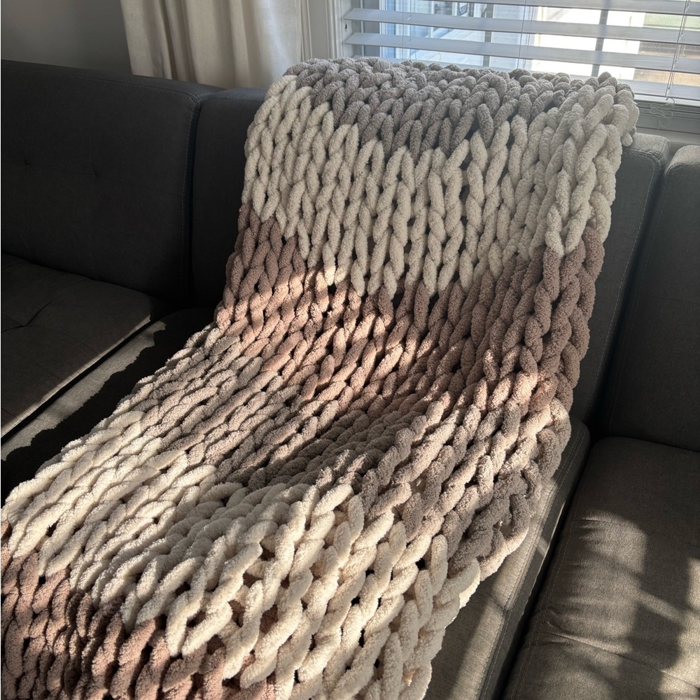 finger knitted thick blanket. made by me :)
